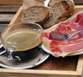 Spanish breakfast Ã¢â¬â coffee, toasts, jamon